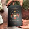 Someone holds a black "Guidance of the Goddess Oracle" box, featuring a goddess under a radiant sun. It's embellished with decorative details and the names Anette Pirso and Israel Gonzalez.