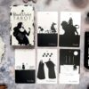 The Black Violet Tarot - The White Deck showcases five cards: The Chariot, Strength, Six of Cups, Six of Pentacles, and Four of Swords. Each card features black and white illustrations with diverse symbolic imagery.