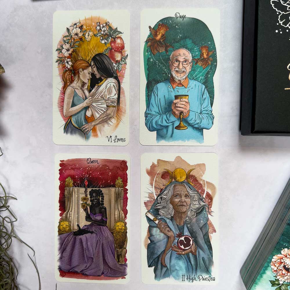 Four cards from The Unfolding Path Tarot are shown: Lovers with an embracing couple, Page depicting an older man with birds, Queen showing a woman in purple amidst flowers, and High Priestess featuring an elderly woman with mystical symbols. Part of the deck is also visible on the right.